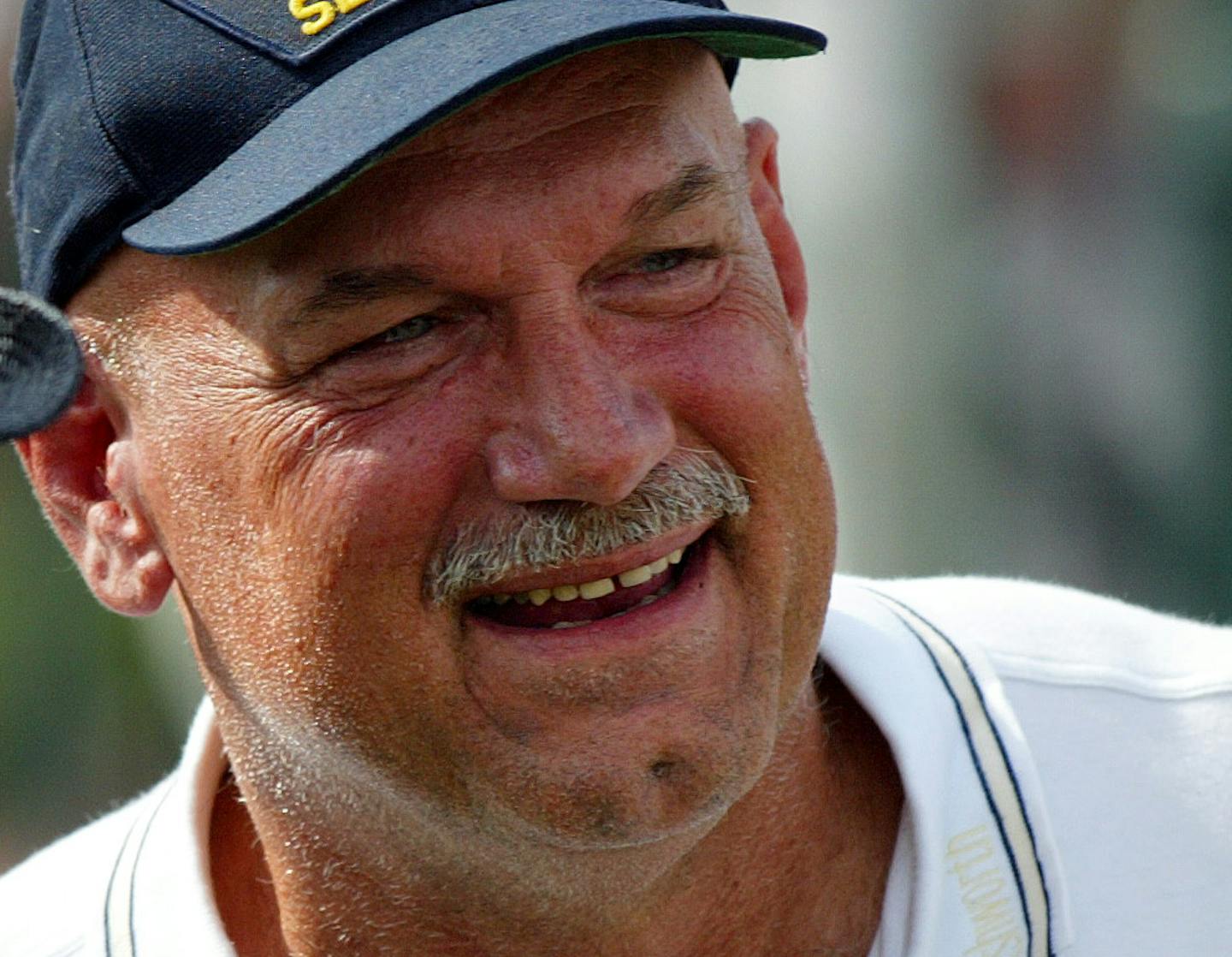 Chaska, MN 8/13/2002 In his element! Minnesota Govenor Jesse Ventura spent some time talking with star golfer Greg Norman after hitting a few balls on the Hazeltine National Golf Club driving range Tuesday afternoon. Ventura got a few tips from pro John Daly in front of a huge crowd