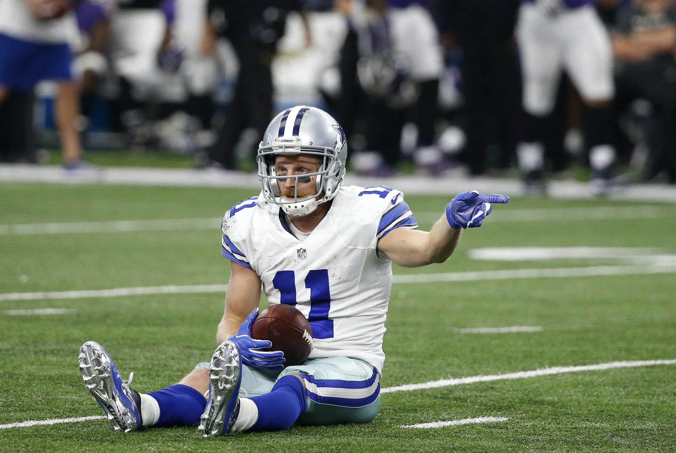 Dallas Cowboys' Cole Beasley signals first down after catching a pass and running the ball for the down in the second half of an NFL football game against the Baltimore Ravens on Sunday, Nov. 20, 2016, in Arlington, Texas. (AP Photo/Michael Ainsworth)