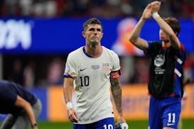 Christian Pulisic of the United States leaves the field after losing 2-1 against Panama in a Copa America Group C match in Atlanta.