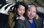 Hmong writer Kao Kalia Yang (left), whose second memoir will be published in May by Henry Holt. The book focuses on the life of her father, Bee Yang (