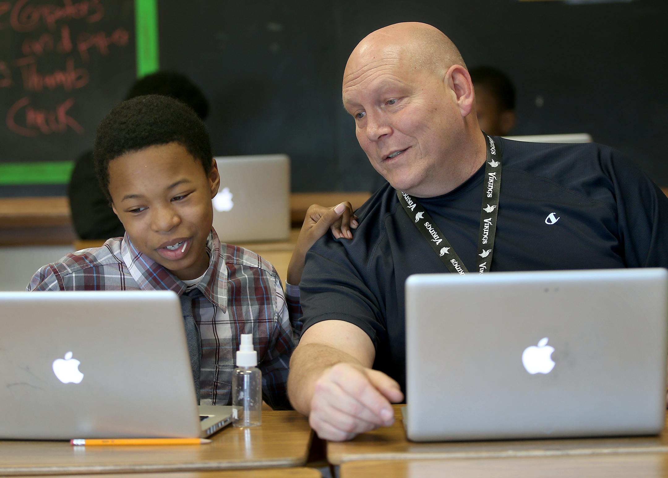Thomas Gothmann, a special education teacher, helps students navigate in a new environment.