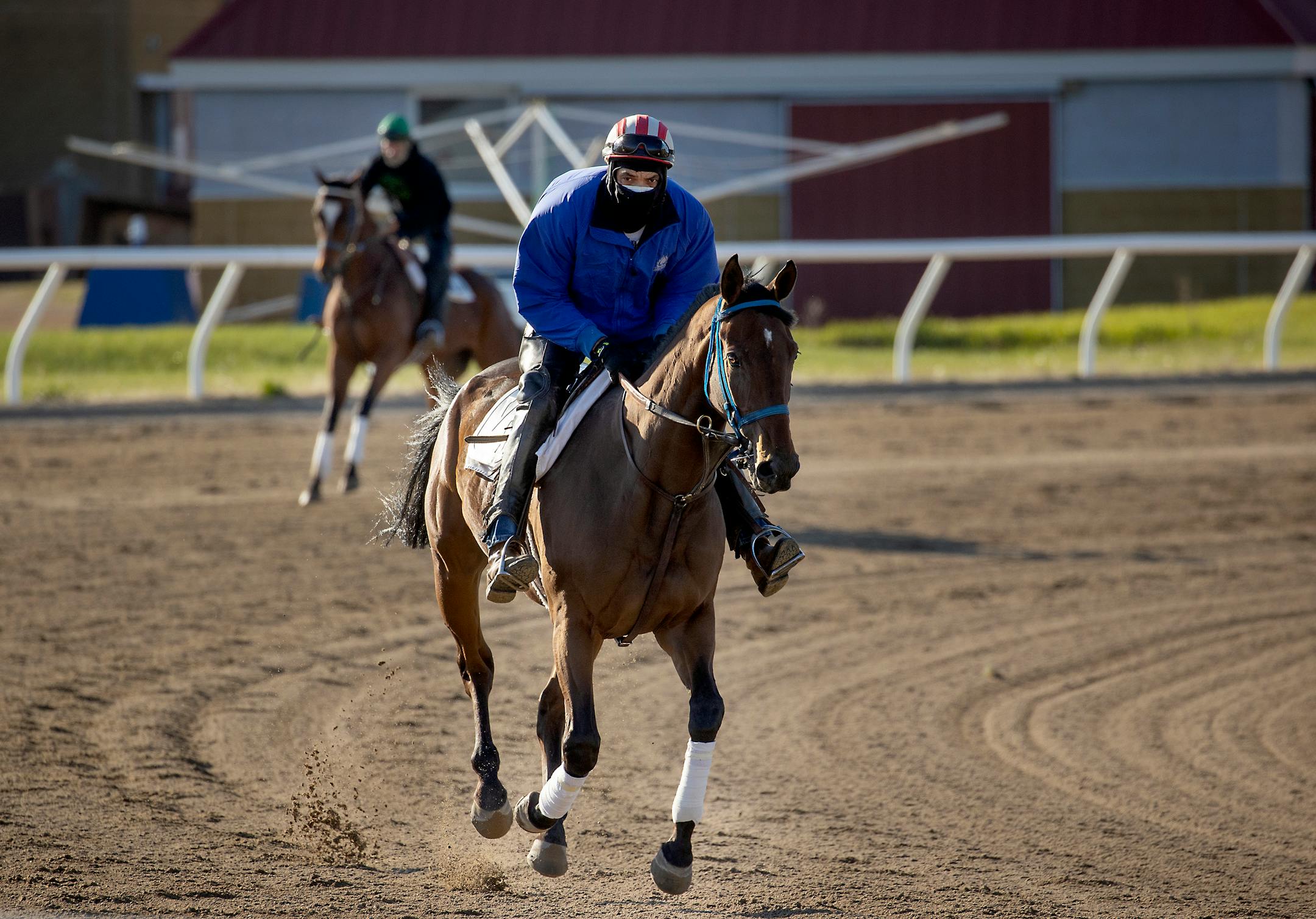 Jason Terjeda trained a horse at Canterbury Park on Tuesday, the first day that horses were allowed on the track. The Minnesota Senate passed a bill Sunday to assist Canterbury Park and Running Aces as they prepare to start their racing seasons without spectators.