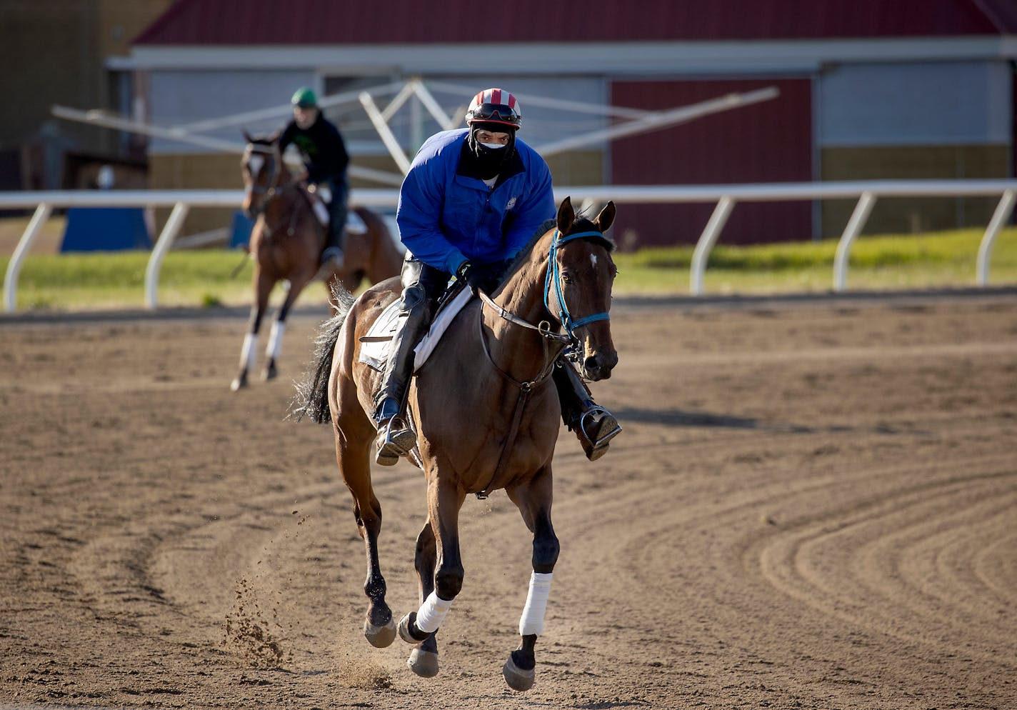 Jason Terjeda trained a horse at Canterbury Park on Tuesday, the first day that horses were allowed on the track. The Minnesota Senate passed a bill Sunday to assist Canterbury Park and Running Aces as they prepare to start their racing seasons without spectators.