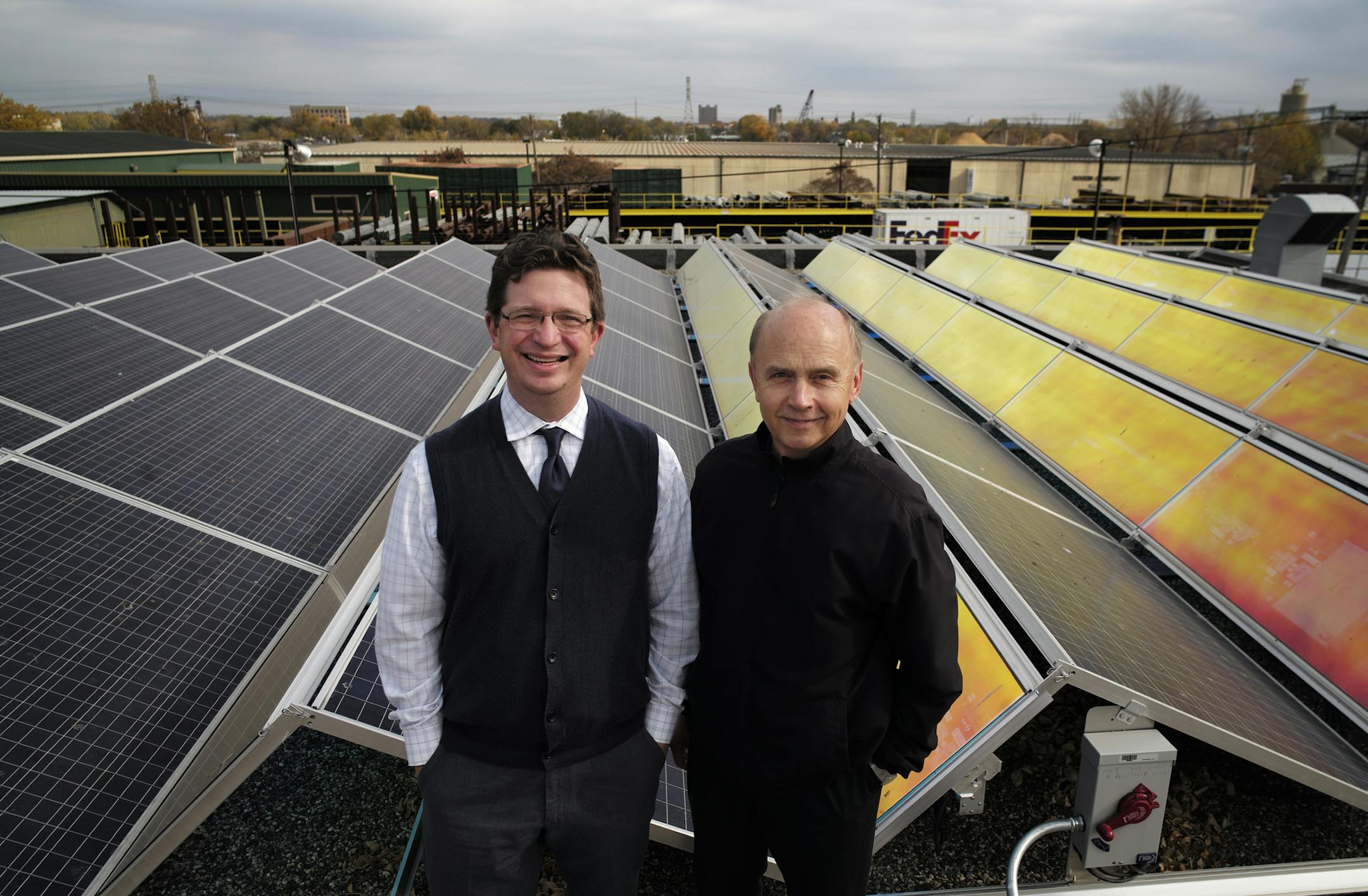 Eutectics CEO Jeremy Kalin, left, a former state representative and lawyer with an architectural background, and Jay Miller,owner of a Minneapolis business r that reconditions and sells diesel-engine crankshafts and huge engine blocks, worked together to finance a solar-energy system atop Crankshaft Supply .]Richard Tsong-Taatarii/rtsong- taatarii@startribune.com