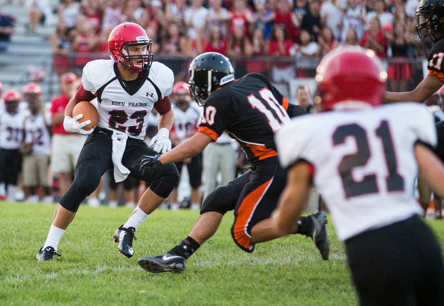 Eden Prairie's Blake Cashman cut upfield during the Eagles' season-opening victory at Minneapolis South.