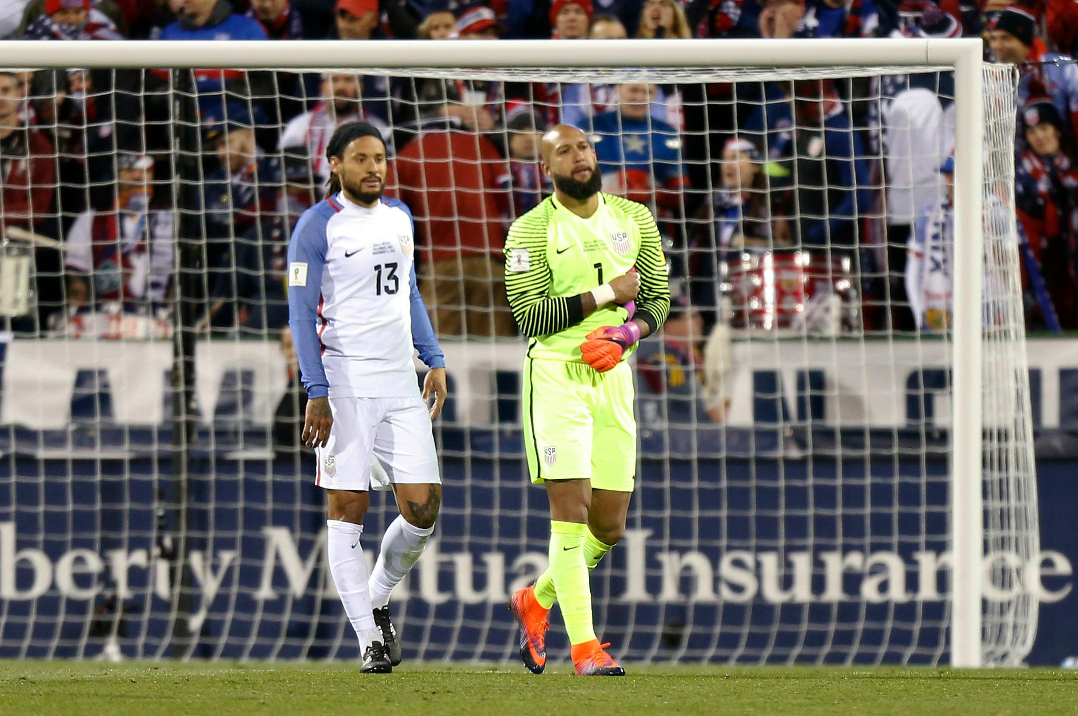 United States' Jermaine Jones, left, and teammate Tim Howard