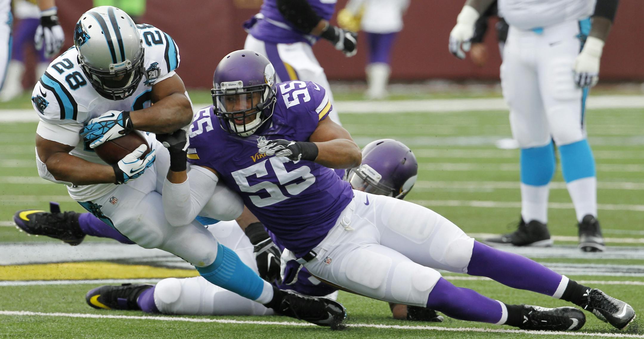 Carolina Panthers running back Jonathan Stewart, left, is tackled by Minnesota Vikings outside linebacker Anthony Barr last season.