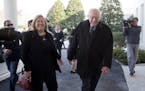 Democratic presidential candidate Sen. Bernie Sanders, I-Vt., with his wife Jane Sanders, walk away after speaking to reporters outside the White Hous