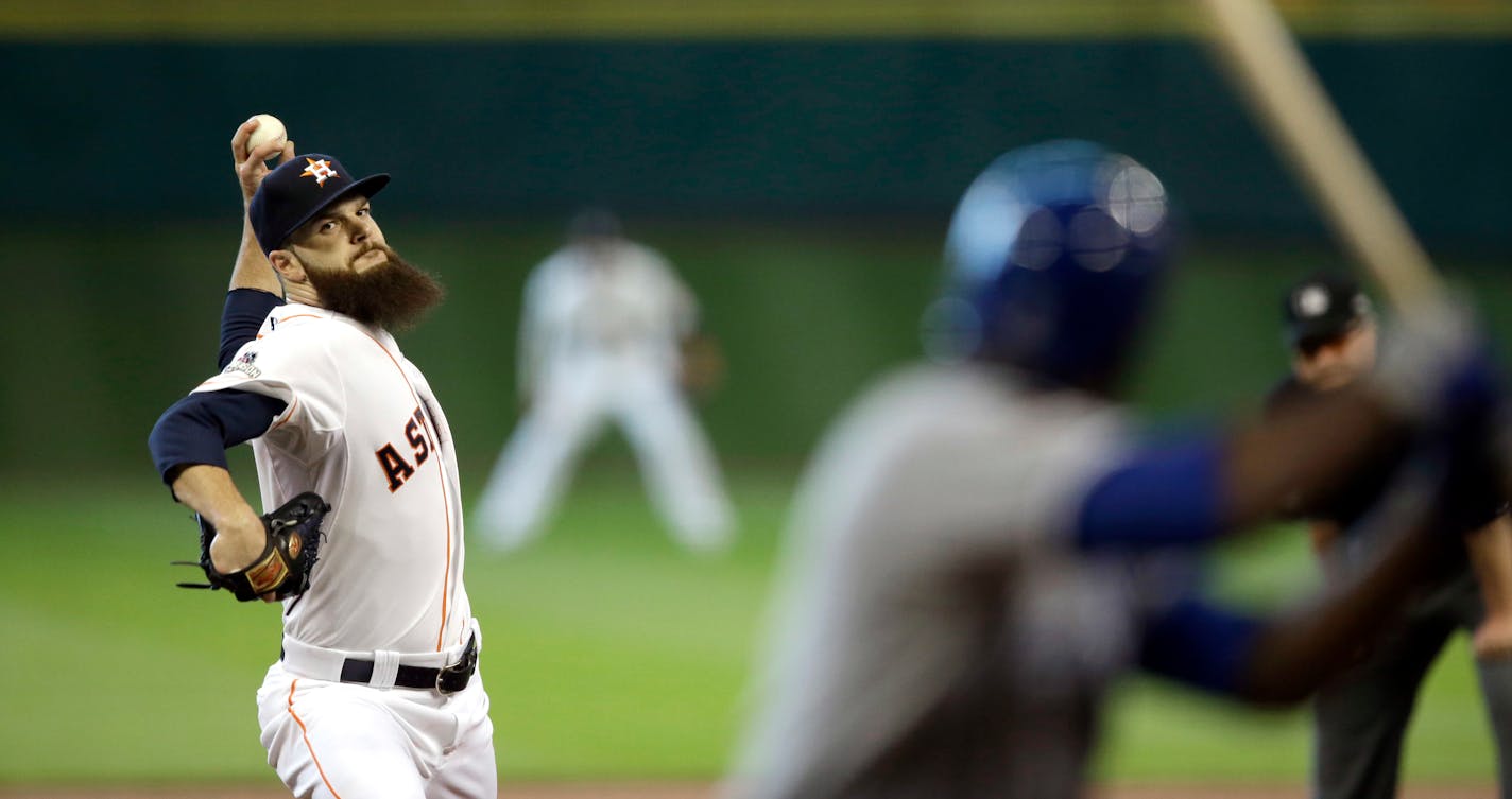 Astros starter Dallas Keuchel threw to the Royals' Lorenzo Cain during the first inning of Game 3 of the ALDS on Sunday. Keuchel pitched seven gutsy innings in leading Houston over Kansas City 4-2 to take a 2-1 lead in the series.