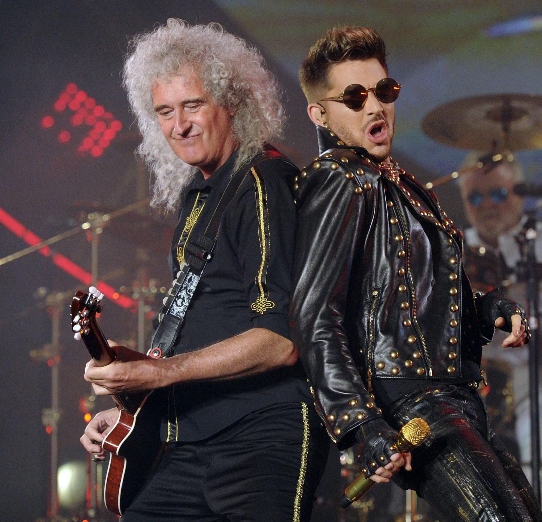 FILE - In this July 3, 2014 file photo Brian May of Queen, left, and Adam Lambert perform in Los Angeles. Queen has clearly found somebody to love in Lambert.
Since joining forces with the &#xec;American Idol&#xee; runner-up for a series of shows in 2012, the band that ruled rock radio in the 1970s and early &#xeb;80s has enjoyed tremendous success, with audiences embracing Lambert as the heir to Freddie Mercury&#xed;s onstage legacy. They&#xed;ve been selling out areas around the world for five