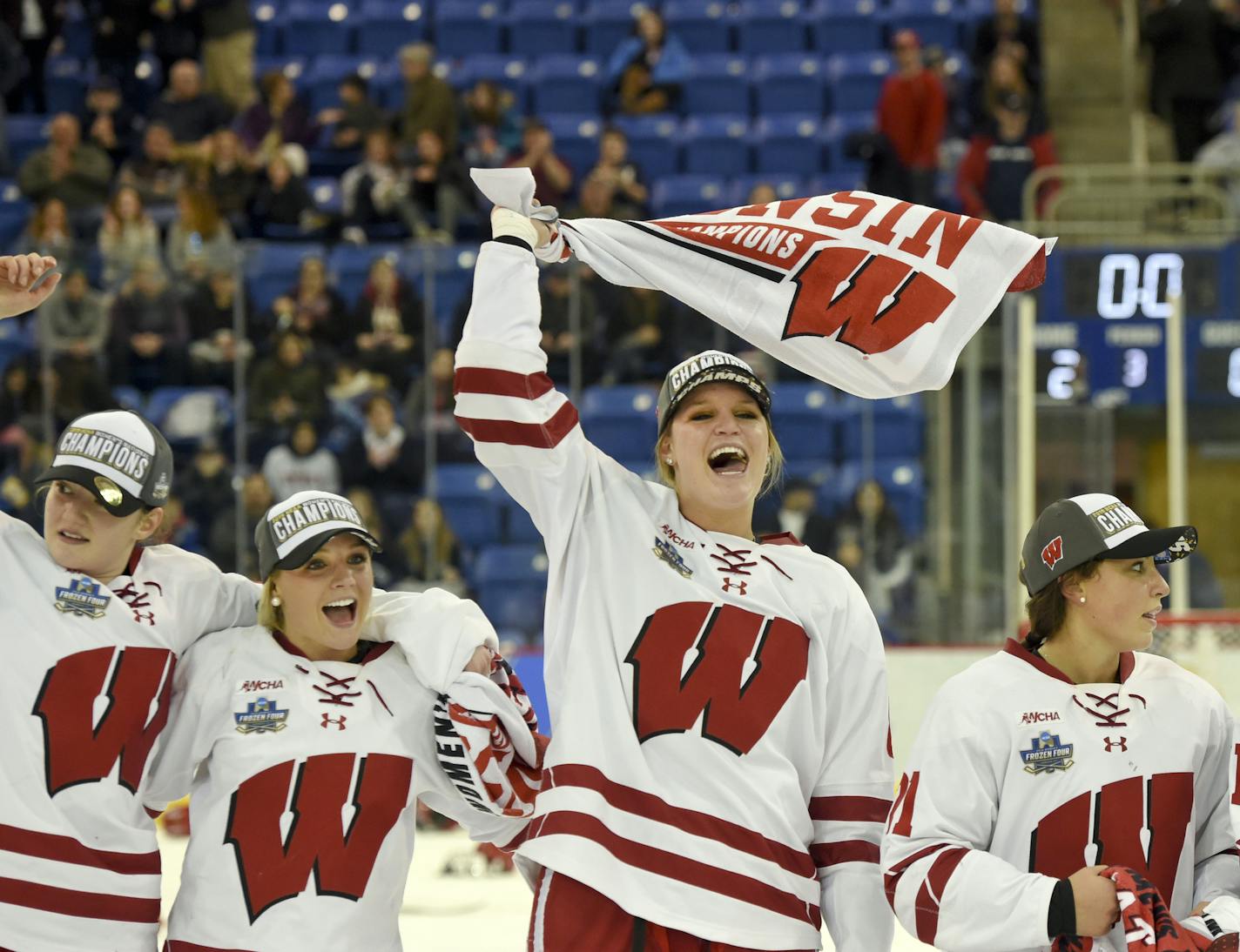 Wisconsin's Maddie Rowe waves her championship towel after her team defeated Minnesota for the NCAA Division I women's Frozen Four championship, Sunday, March 24, 2019, in Hamden, Conn. (AP Photo/Stephen Dunn)