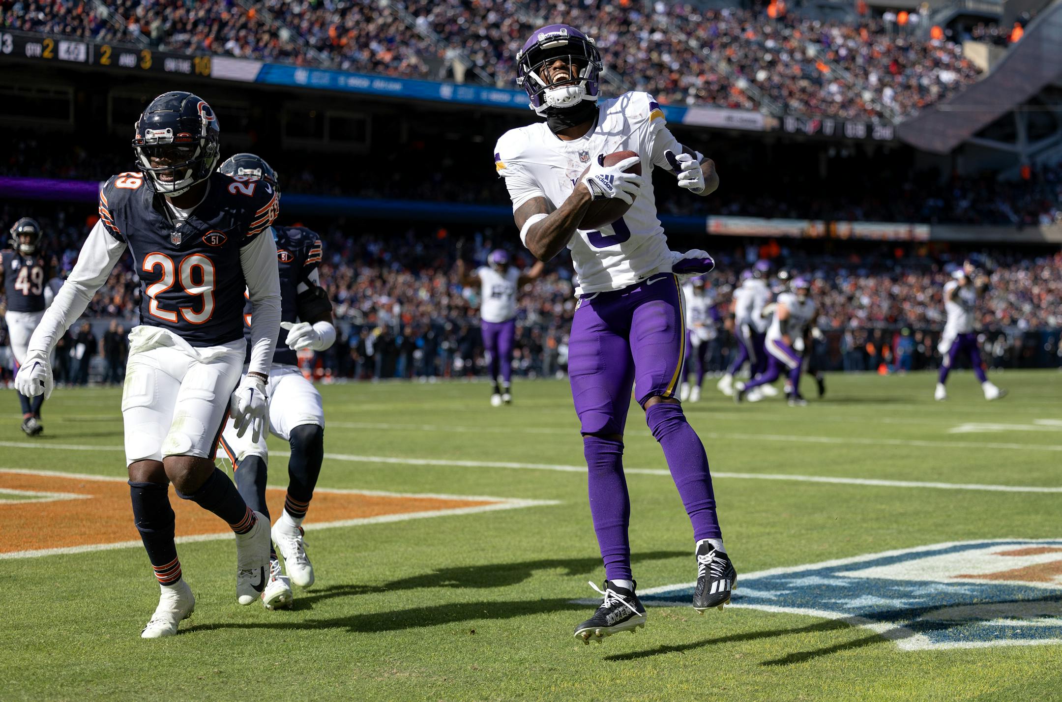 Minnesota Vikings receiver Jordan Addison (3) catches a touchdown pass in the second quarter Sunday, October 15, 2023, at Soldier Field in Chicago, Ill.