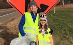 Young Jayna Kelley, with her mother, Robin Kelley, a teacher at Jayna's elementary school, during the roadside cleanup on Saturday. The photo was take