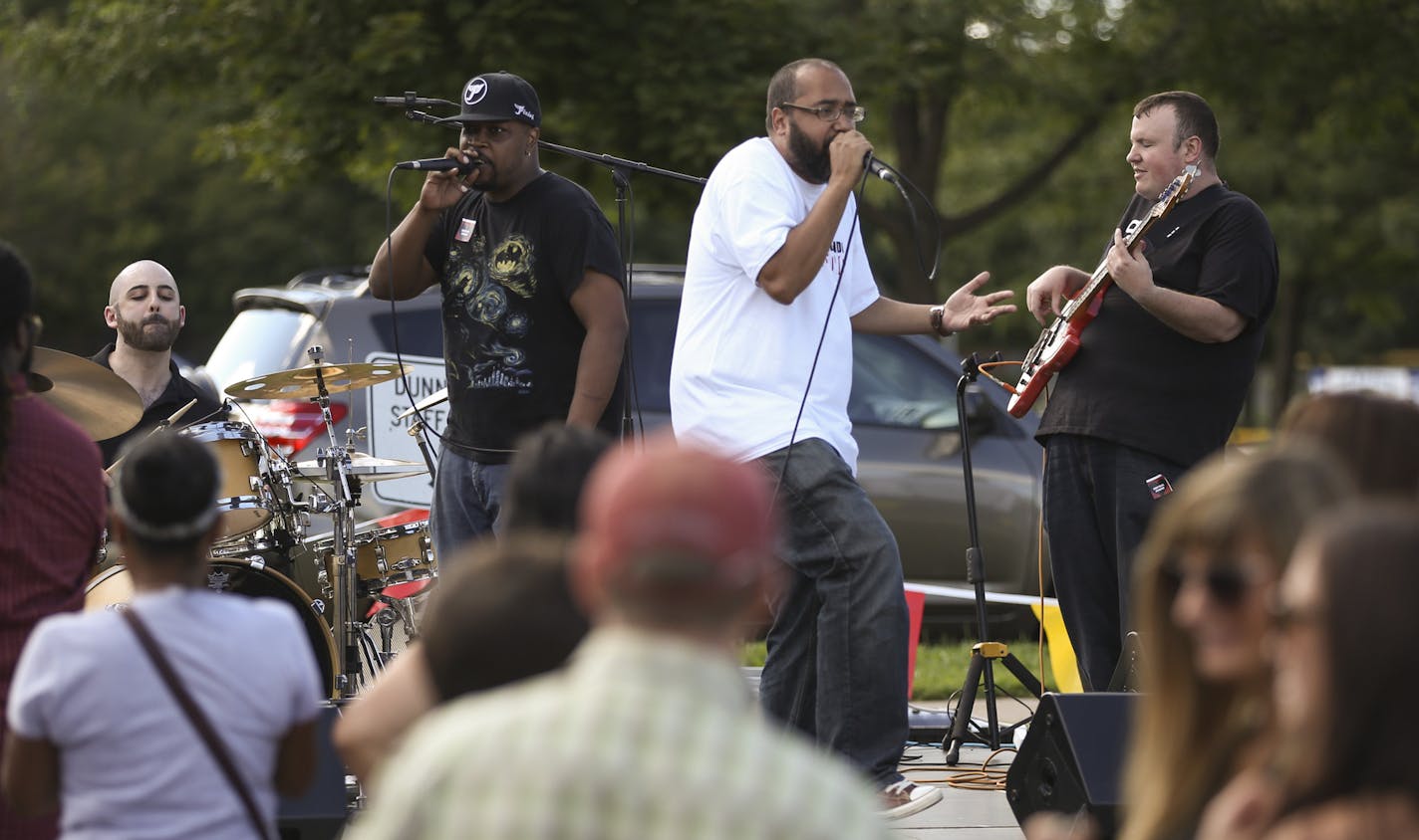 Heiruspecs, the band that formed when its members were still at Central High School drew a strong crowd to the Dunning Recreation Center for the event to honor Philando Castile Sunday afternoon. The vocalists are Muad'Dib, left, and Felix, with Peter Leggett on drums and Sean McPherson on bass.