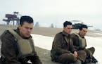 This image released by Warner Bros. Pictures shows Harry Styles, from left, Aneurin Barnard and Fionn Whitehead in a scene from "Dunkirk." Styles, 23,