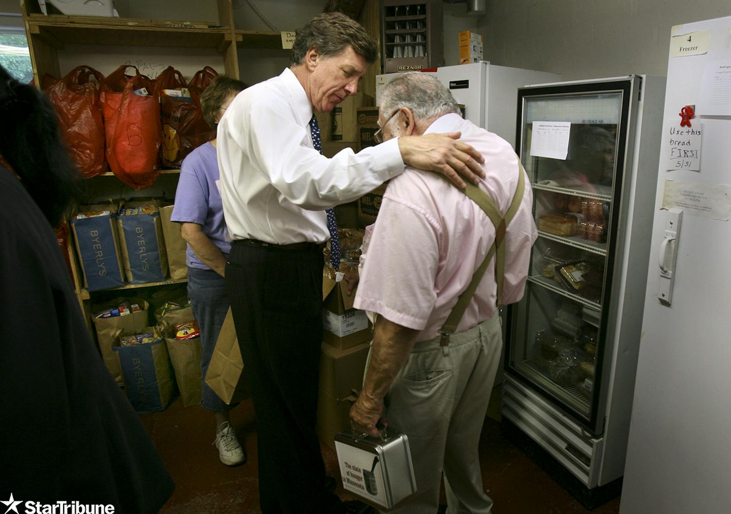 In 2006, U.S. Rep. Jim Ramstad, left, and Hy Rosen, then-director of the Greater Lakes Food Bank, shared a moment after a hunger news conference.