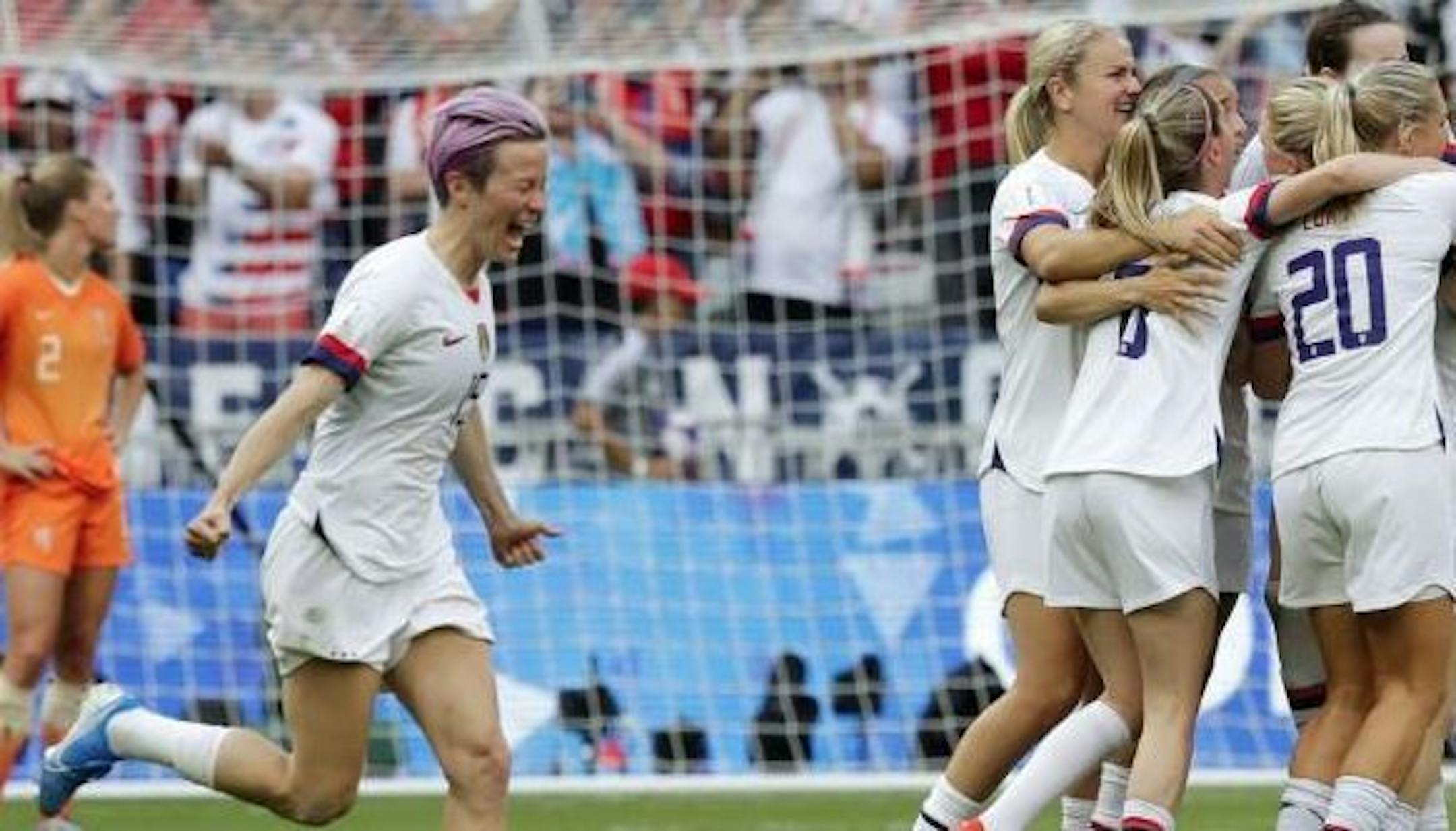 Megan Rapinoe and her teammates soak in a world title Sunday.
