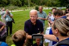 Former Vice President Joe Biden, a Democratic presidential hopeful, greets attendees at the Polk County Democrats' annual Steak Fry in Des Moines, Iow