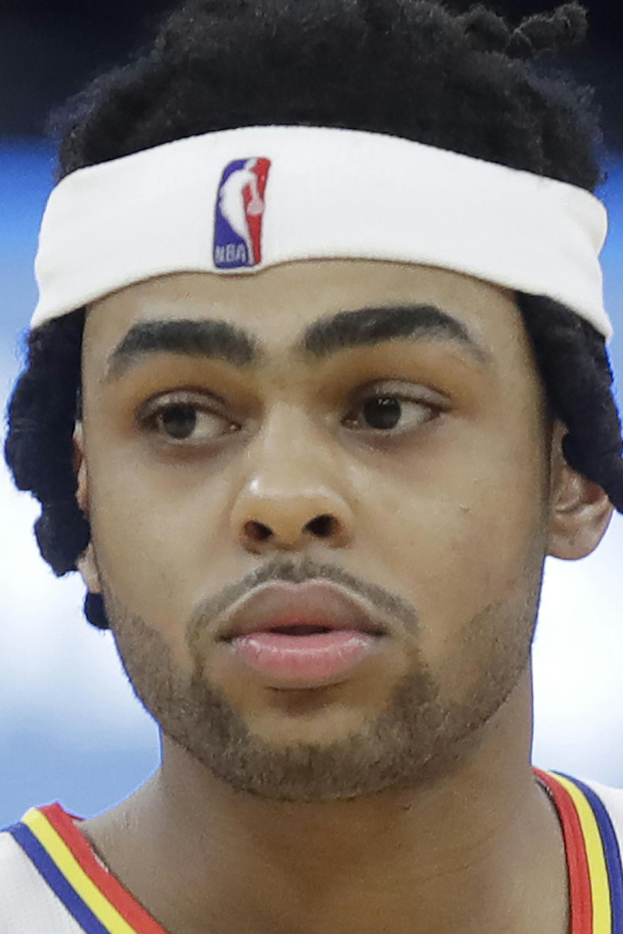 Golden State Warriors guard D'Angelo Russell (0) against the Minnesota Timberwolves during an NBA basketball game in San Francisco, Monday, Dec. 23, 2019. (AP Photo/Jeff Chiu)