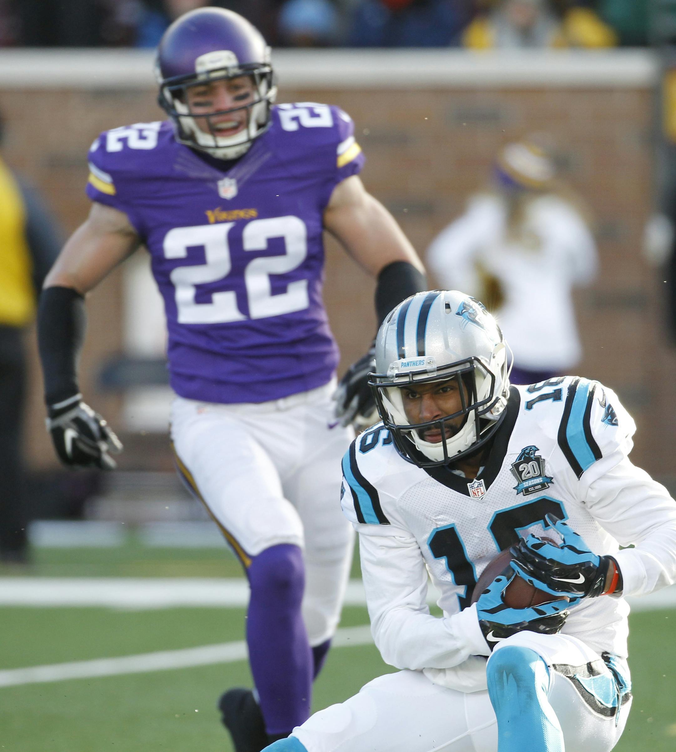 Carolina Panthers wide receiver Philly Brown (16) catches a 32-yard touchdown pass in front of Minnesota Vikings free safety Harrison Smith during the second half of an NFL football game, Sunday, Nov. 30, 2014, in Minneapolis. (AP Photo/Ann Heisenfelt)