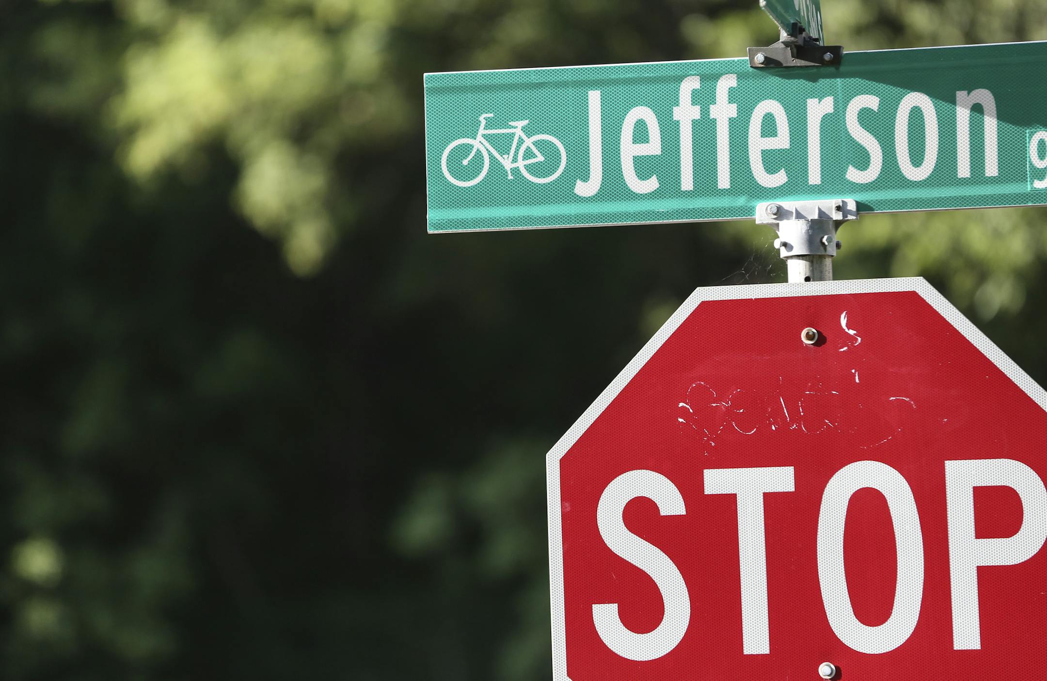 A bicycle sign on the Jefferson Ave street sign on Monday, August 11, 2014, in St. Paul, Minn. ] RENEE JONES SCHNEIDER • reneejones@startribune.com