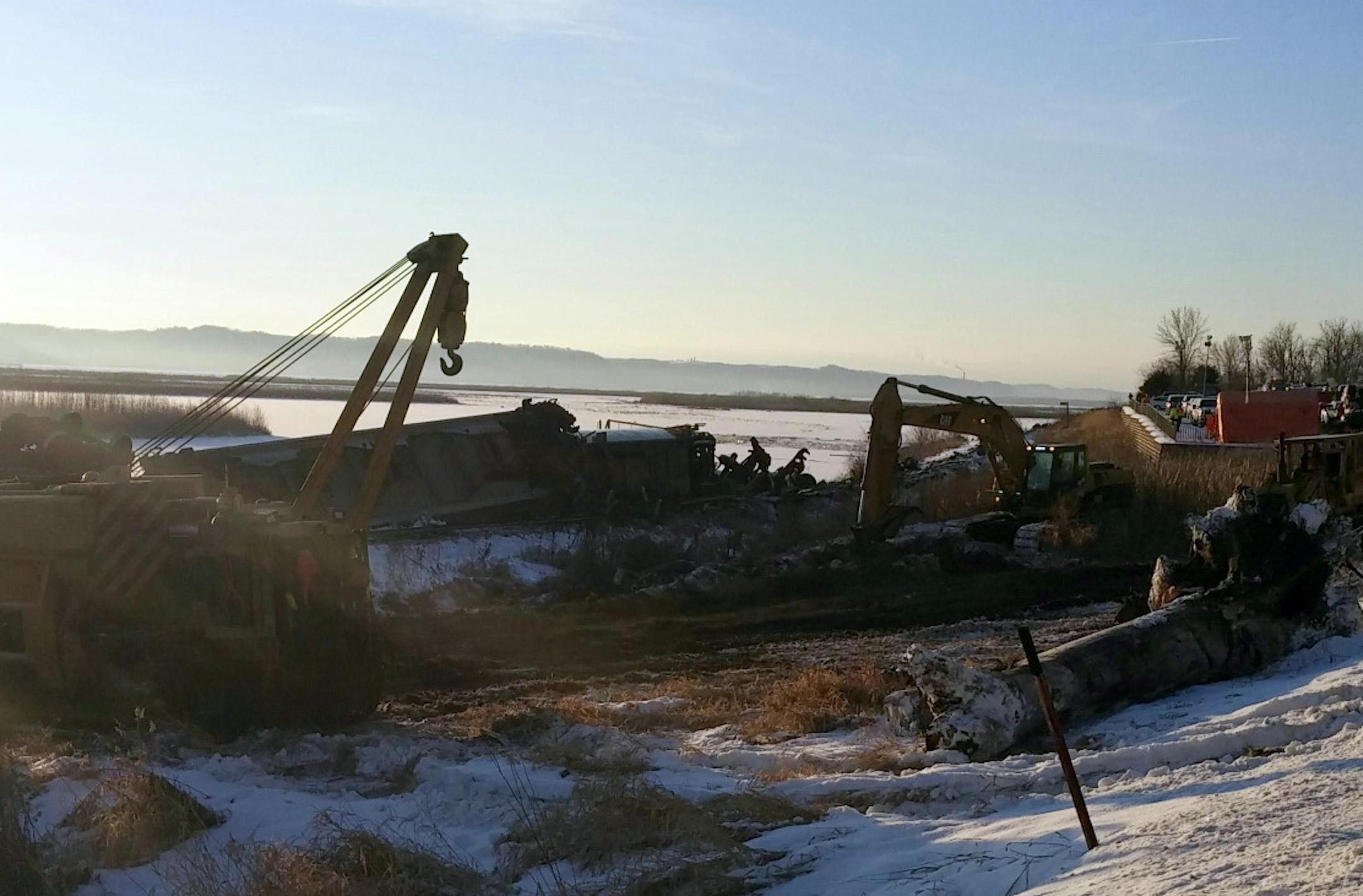 A freight train derailed late Tuesday, sending several cars into the Mississippi River.
