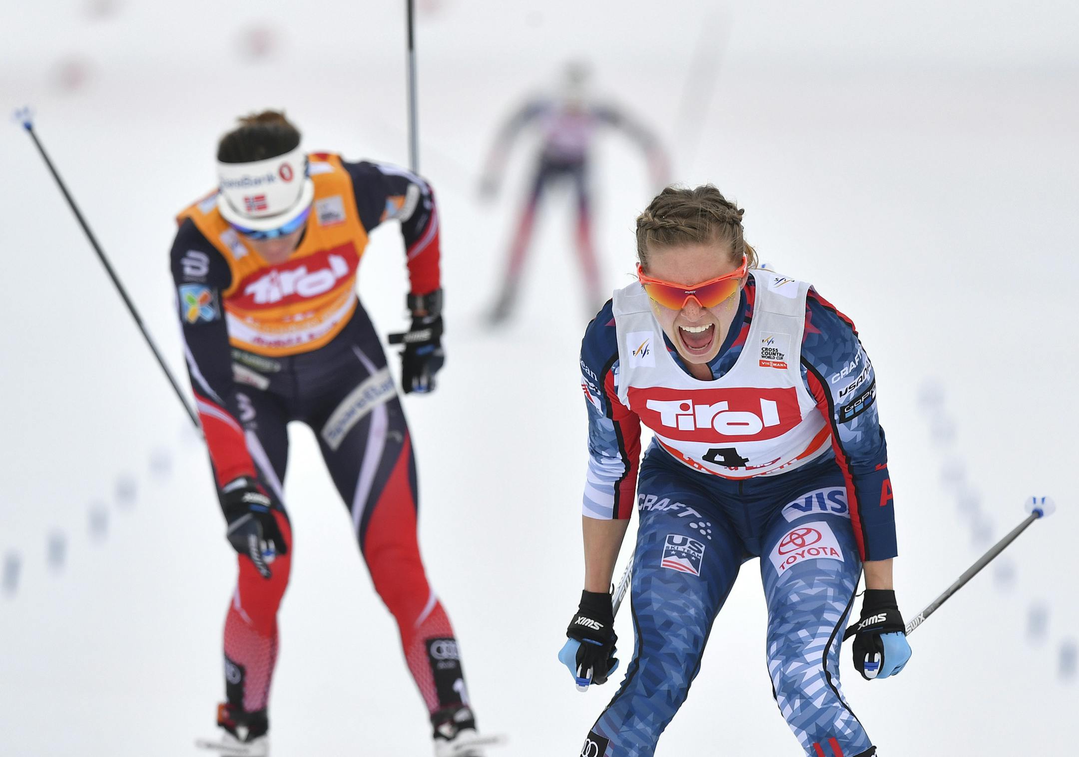 Winner Jessie Diggins of Afton, Minn., right, celebrated at the end of the ladies' 10K Cross-Country World Cup competition in Seefeld, Austria, on Sunday.