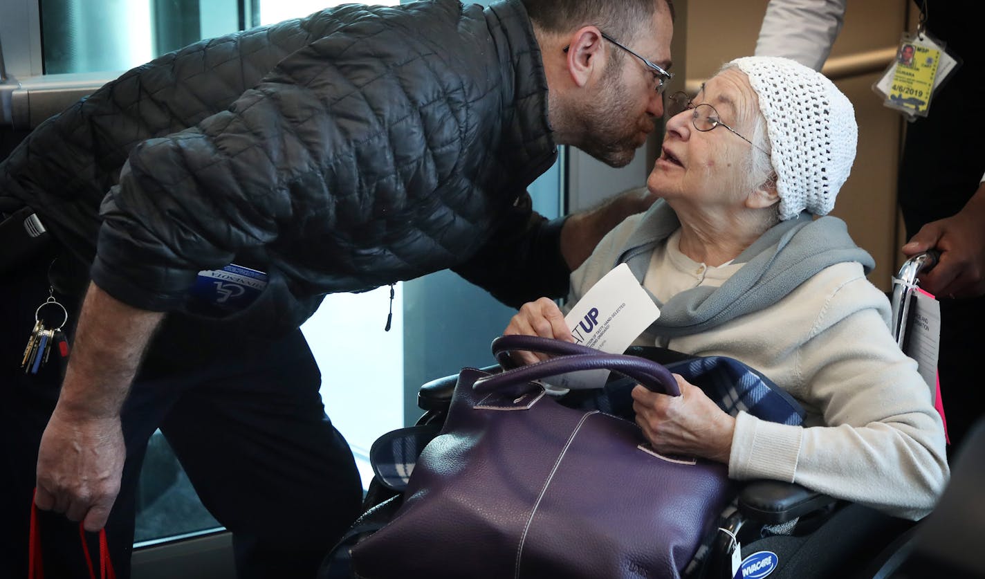 Mery Maruani 87, of St. Louis Park got a goodbye kiss from her son Leo Maruani. She was the first passenger to board JetBlue flight 836 to Boston from MSP Thursday. Mery has a connecting flight to Tel Aviv, Israel.