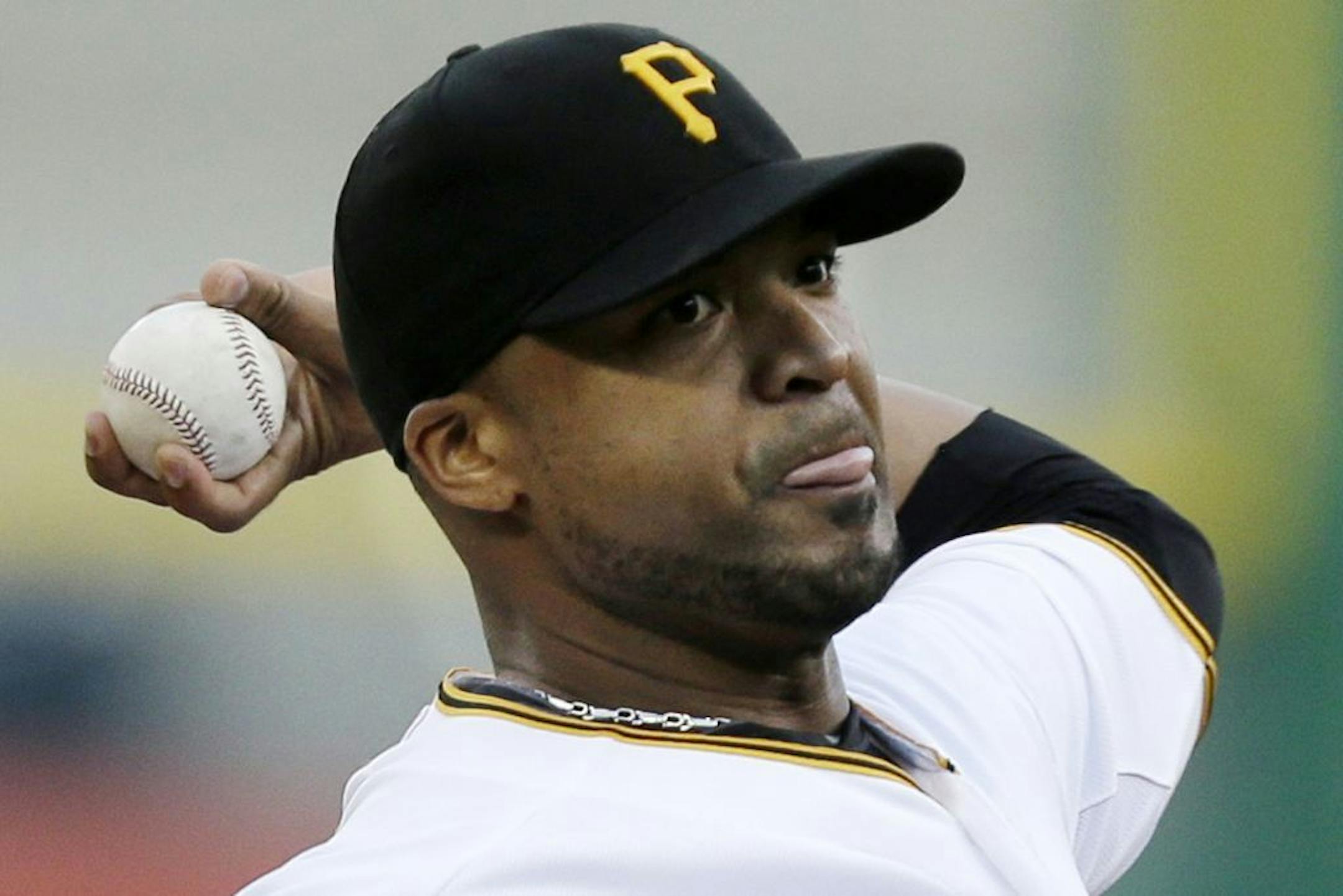 Pittsburgh Pirates starting pitcher Francisco Liriano delivers during the first inning of a baseball game against the St. Louis Cardinals in Pittsburgh Monday, July 29, 2013.
