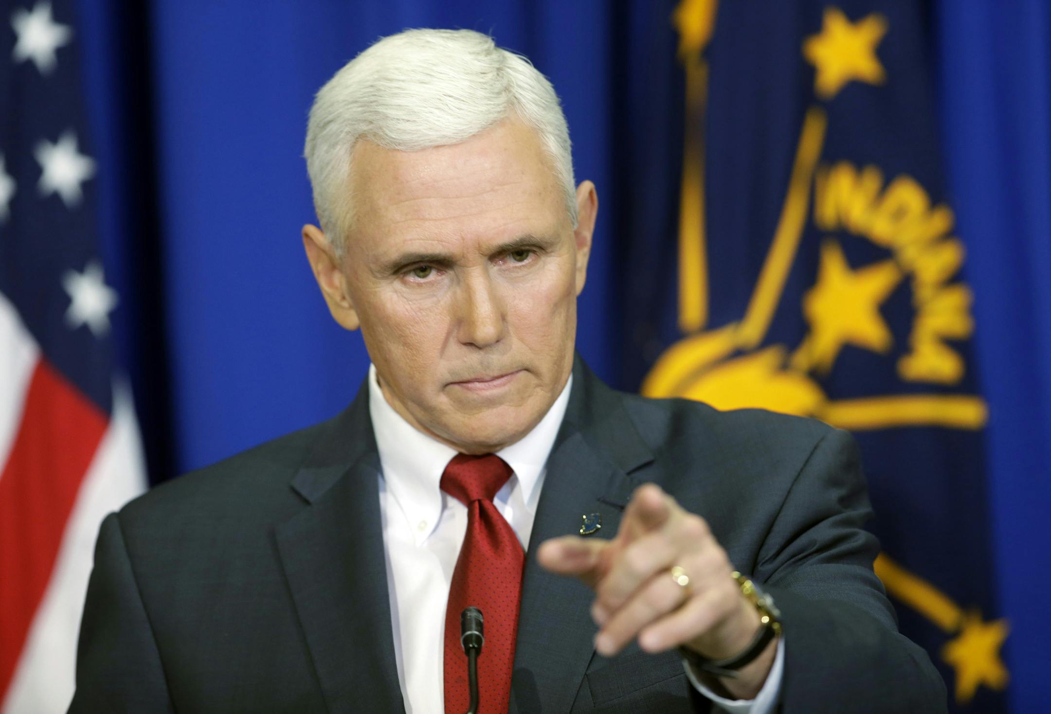 Indiana Gov. Mike Pence takes a question during a news conference, Tuesday, March 31, 2015, in Indianapolis. Republicans hoped to avoid a debate over social issues heading into the next presidential contest. Yet the backlash over a so-called religious freedom law in Indiana is highlighting the party’s overwhelming opposition to same-sex marriage and forcing the GOP’s leading presidential contenders to weigh in. "It’s been a tough week," Pence said at the news conference.