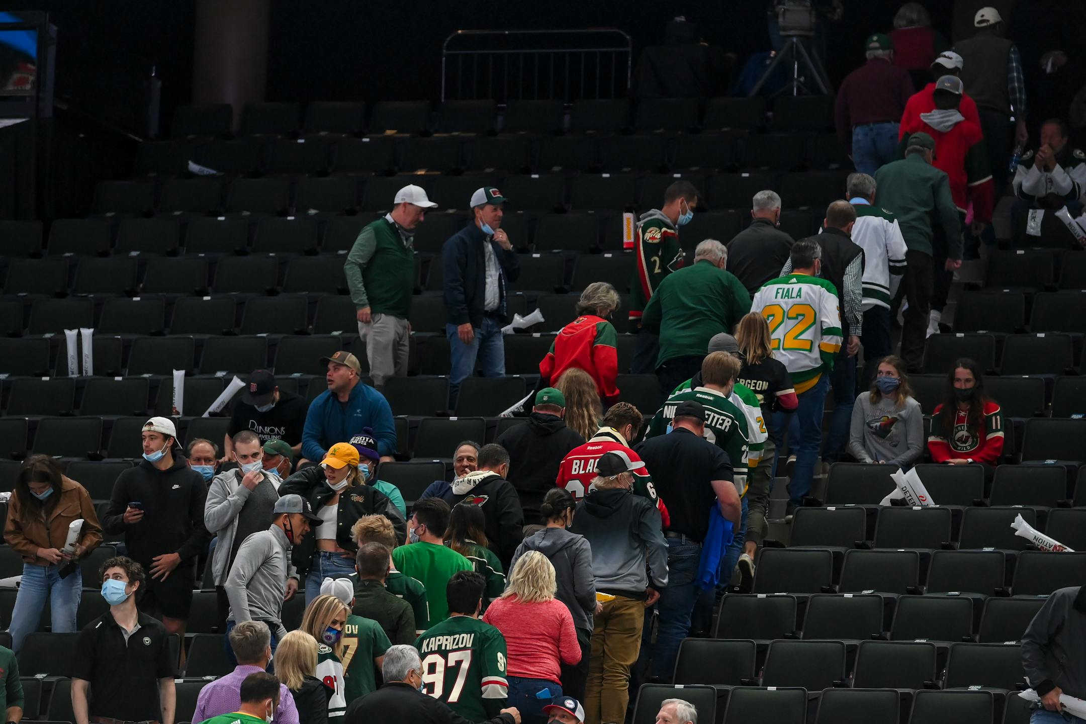 Wild fans streamed out the of arena after a goal by Vegas Golden Knights center Mattias Janmark (26) gave Vegas a 4-2 win lead over Minnesota late in the third period.