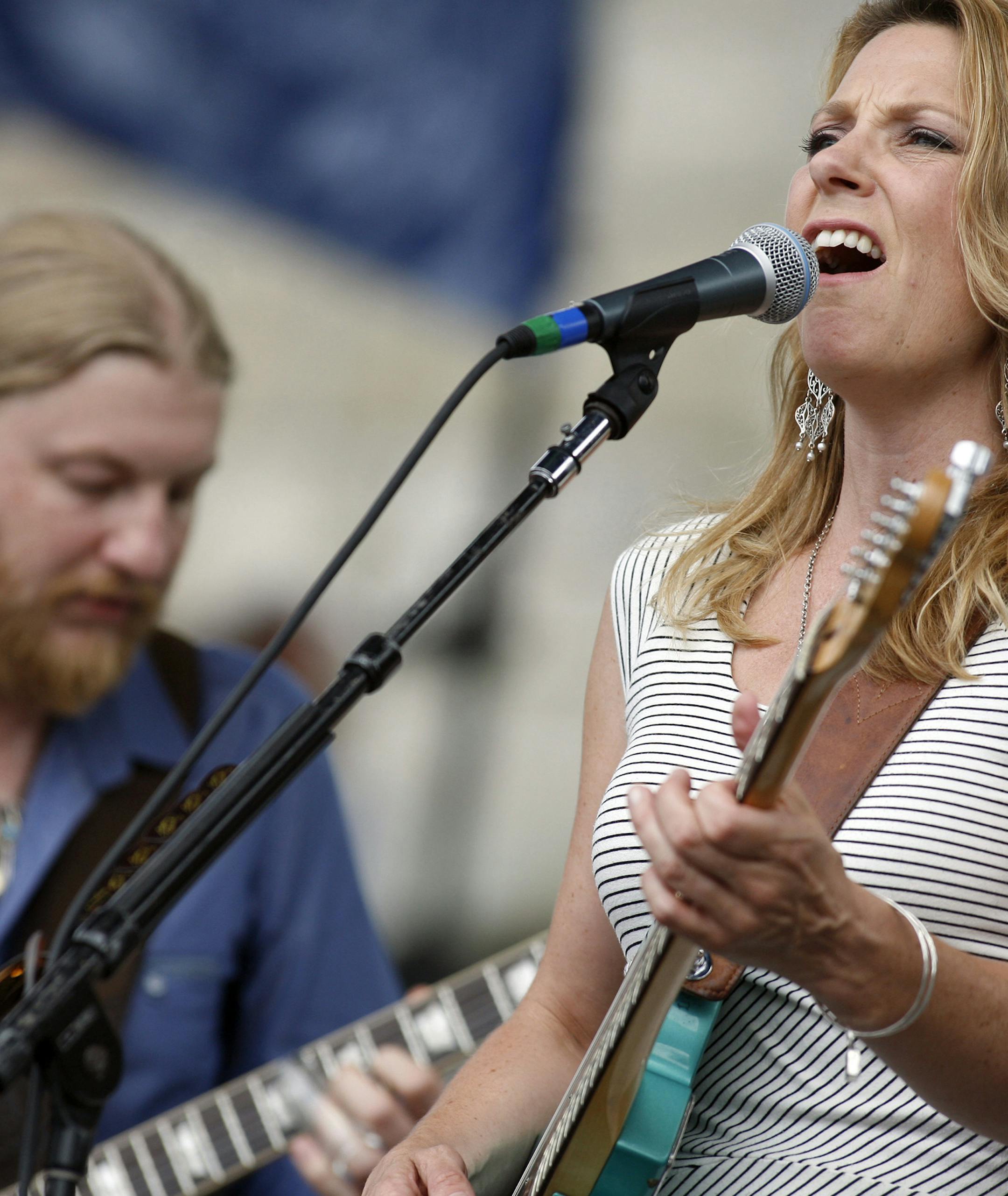 Susan Tedeschi and Derek Trucks perform with the Tedeschi Trucks Band at the Newport Jazz Festival in Newport, R.I. on Sunday, Aug. 5, 2012. (AP Photo/Joe Giblin) ORG XMIT: RIJG120