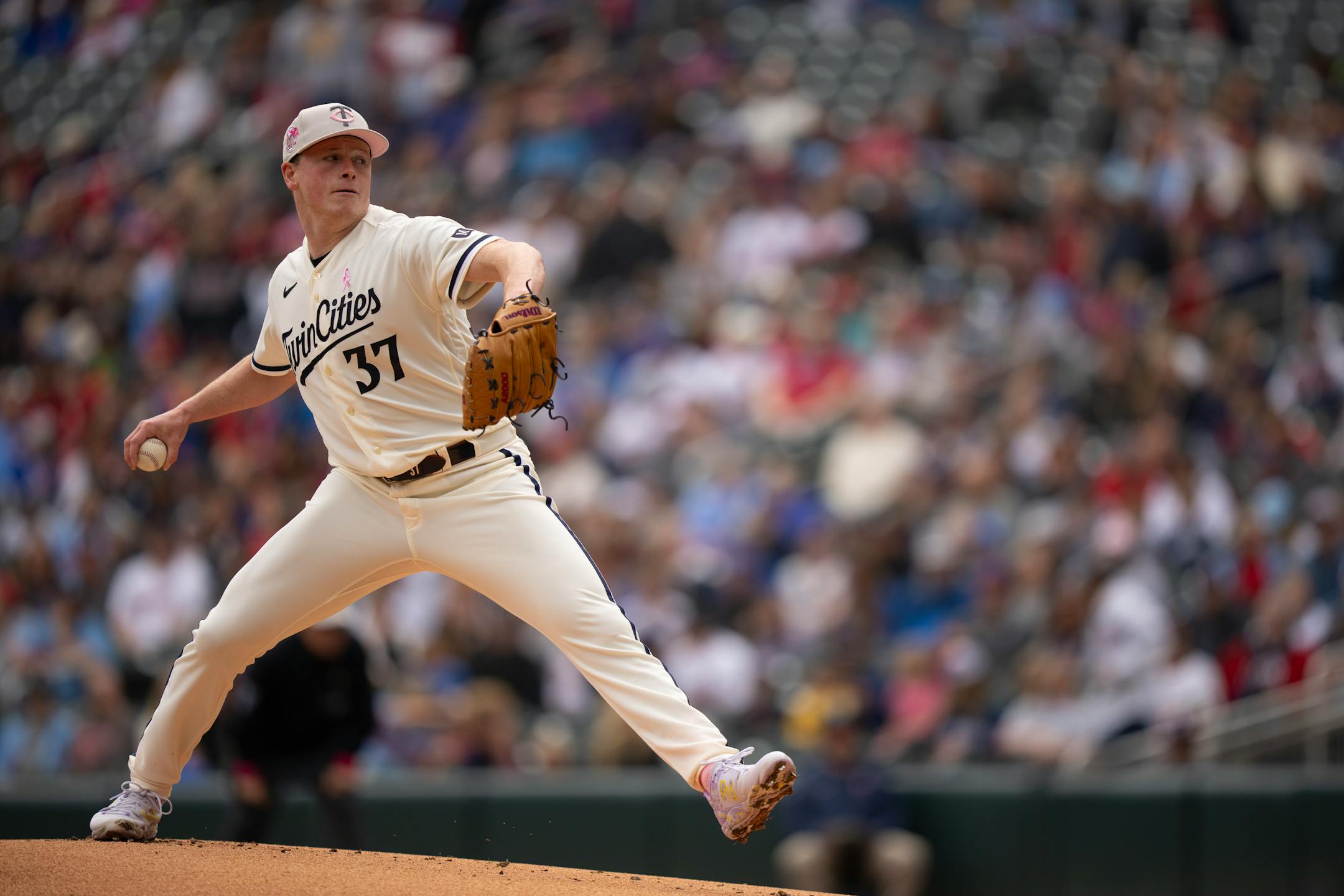 Minnesota Twins starting pitcher Louie Varland throws in the first inning.