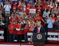 President Donald Trump addressed his supporters at a rally in Target Center in Minneapolis. ] President Donald Trump addressed his supporters at a ral