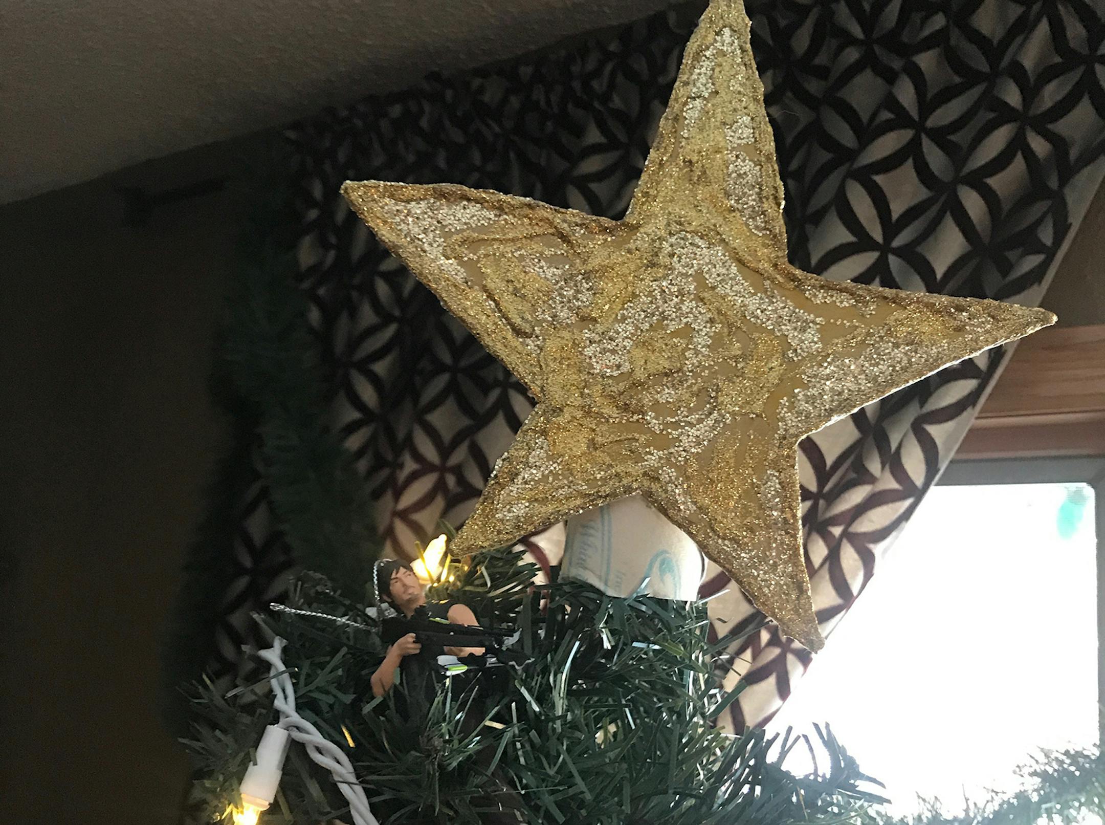 "The Christmas of 1984 my husband and our 3-year-old son sat down with a piece of cardboard, some glitter, glue, and a toilet paper roll to create this star for our Christmas tree. 35 years later; This star, with a bit more glitter and a lot more glue, is still adorning our son';s family tree."
Monica Rosen, Apple Valley