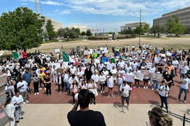 Oklahoma City immigration attorney Sam Wargin Grimaldo speaks to a group outside the Oklahoma Capitol on Tuesday, April 23, 2024, who opposed a bill t