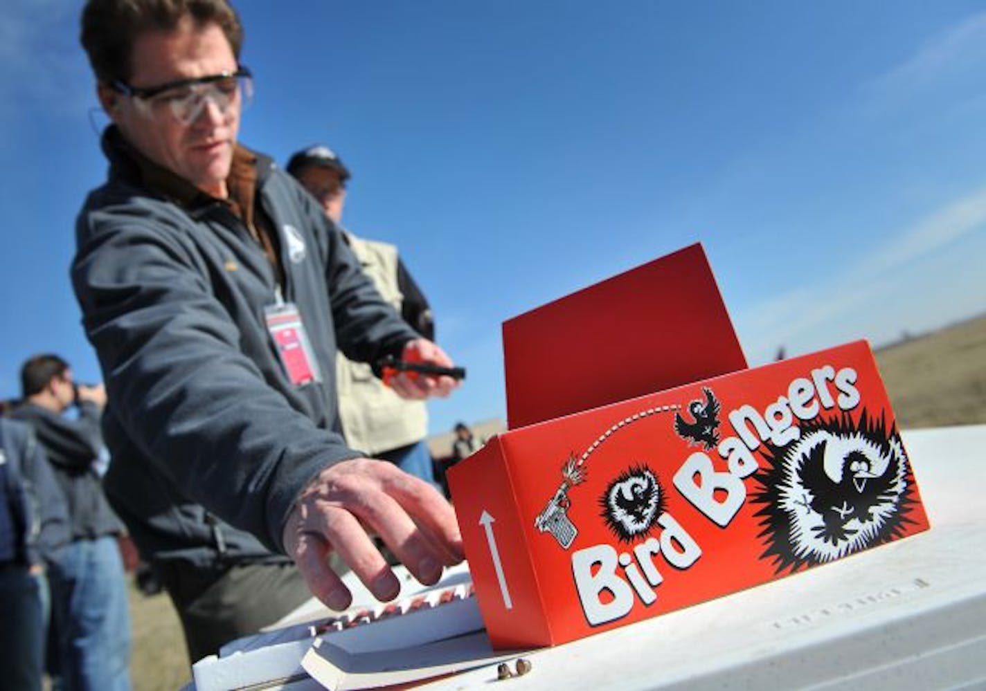 Jon Oesterreich trained MAC employees on using pyrotechnics to drive birds away. The fireworks-like devices create loud booms or screeches.