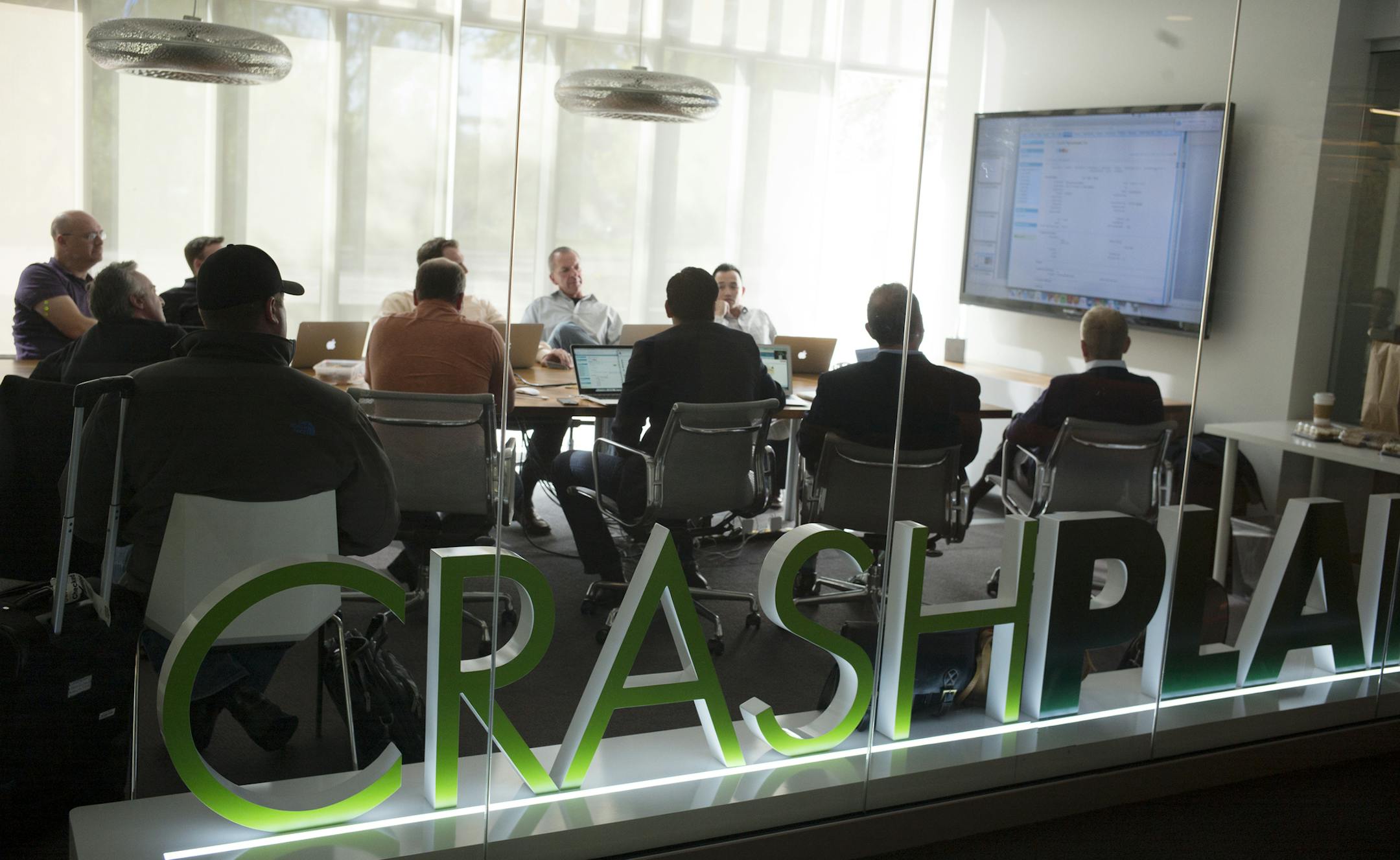 A staff meeting in a conference room with the "CRASHPLAN" personal backup software sign.] On October 6, 2014 Code 42, the Minneapolis software company, launches what its executives call its biggest product ever, a program to share data inside companies.Richard Tsong-Taatarii/rtsong- taatarii@startribune.com