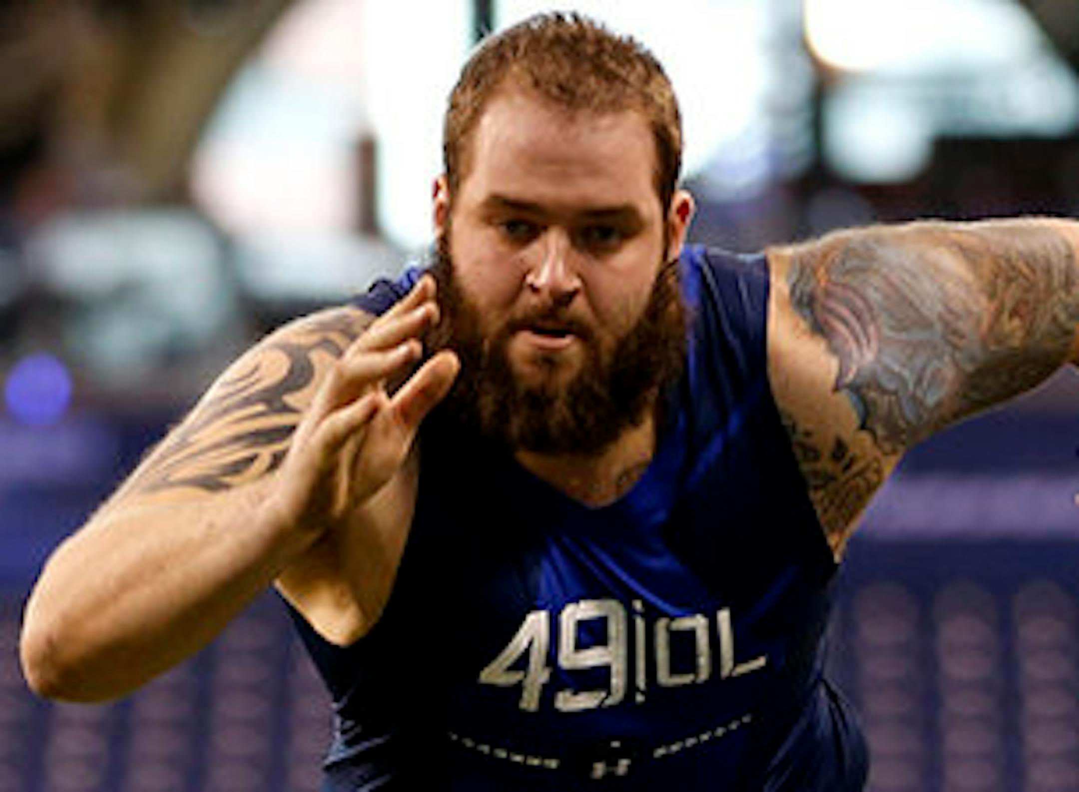 Alabama offensive lineman Austin Shepherd runs a drill at the NFL football scouting combine in Indianapolis, Friday, Feb. 20, 2015. (AP Photo/Julio Cortez)
