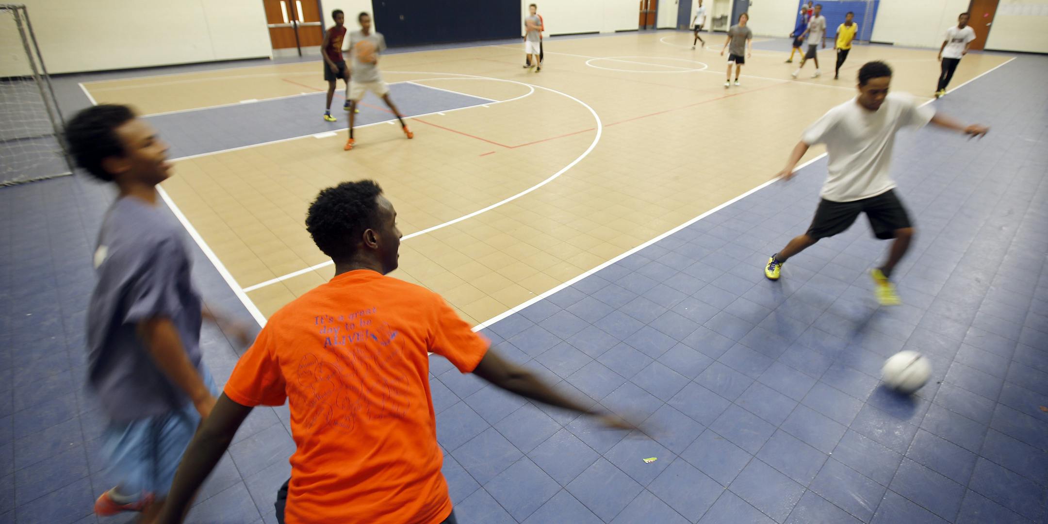 Affordable space is limited for most Minneapolis soccer teams, especially in the winter. Here, a team squeezes into the gymnasium at Dugsi Academy in St. Paul.
