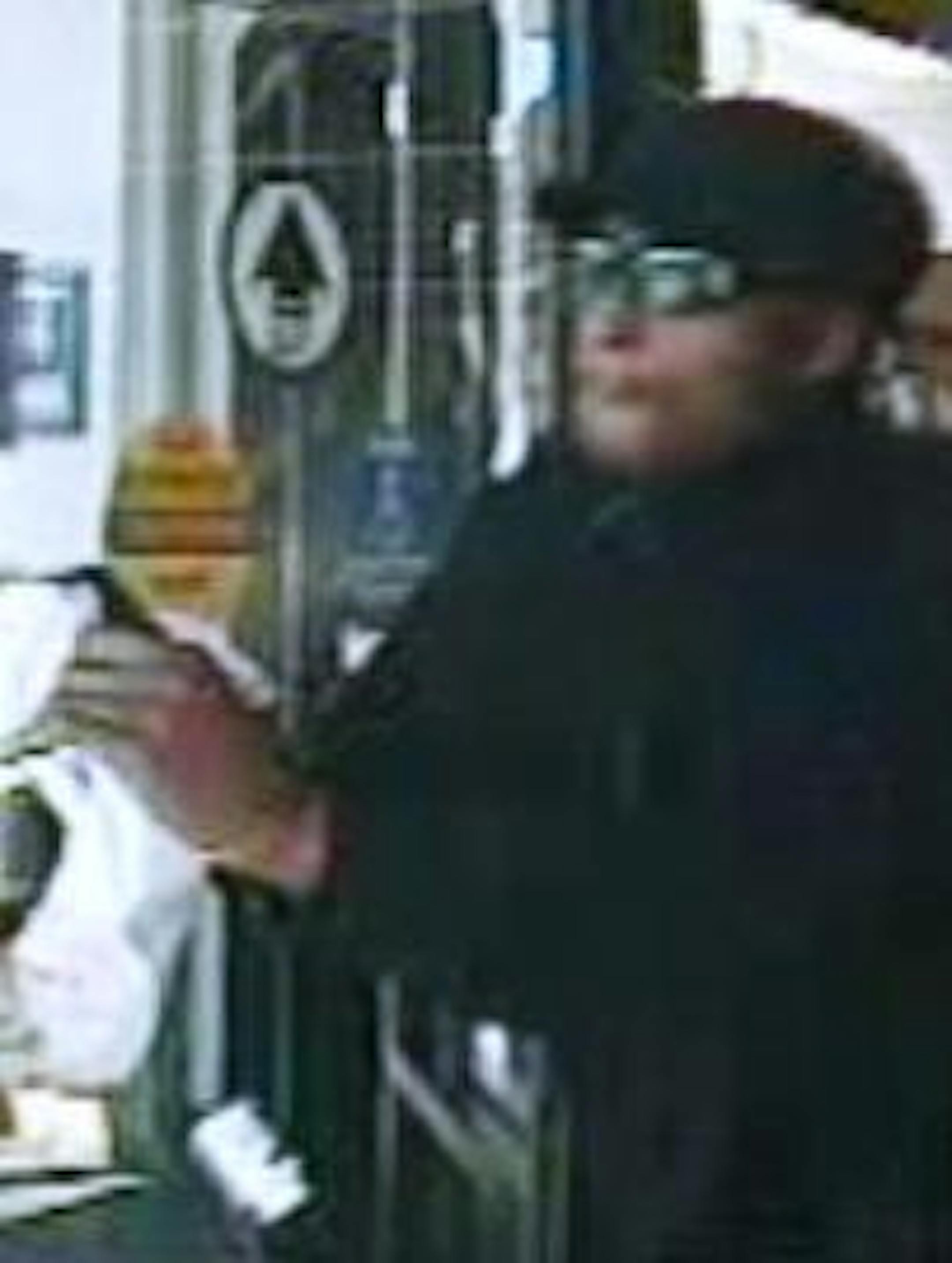 Image of suspect wanted in West Lake Street Walgreen's Pharmacy robbery on 9/11/2011.