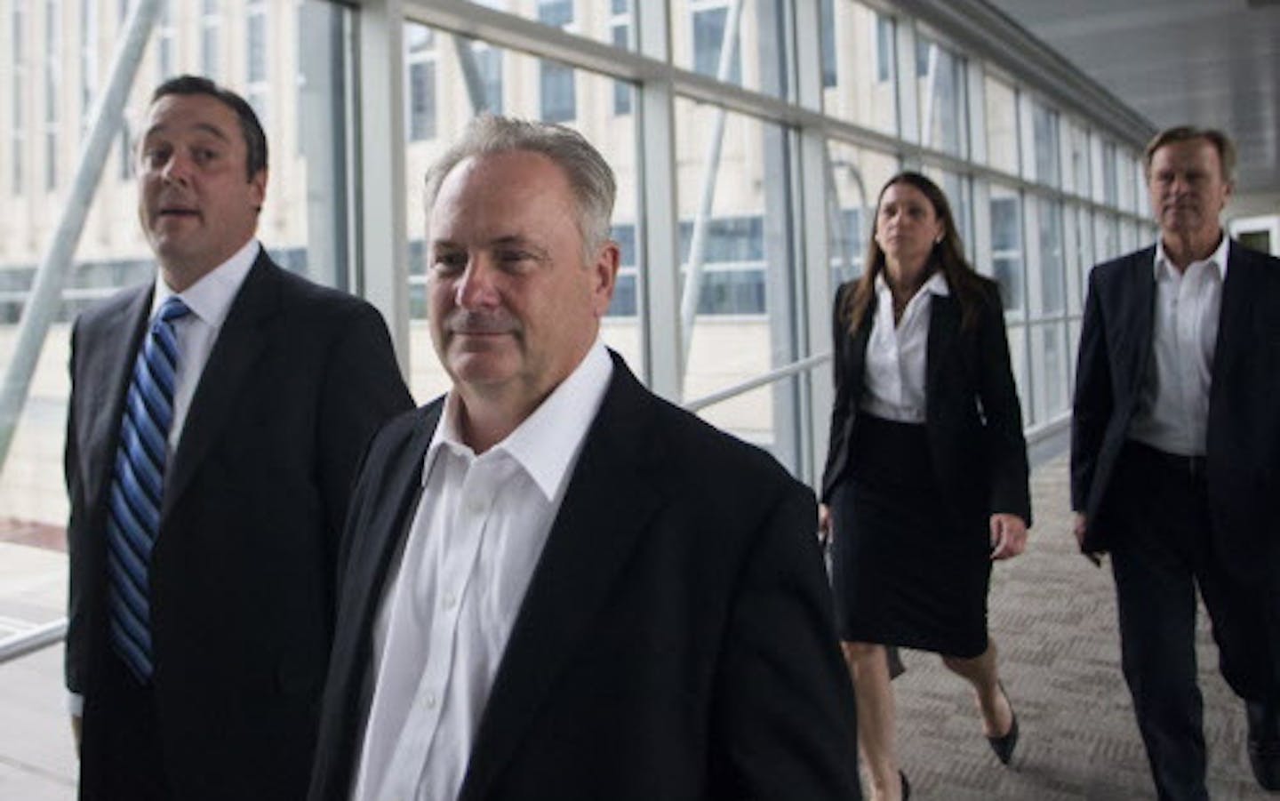 Former Starkey president Jerome C. Ruzicka and former Starkey human resources manager Larry W. Miller (far right) left the Federal Courthouse on Friday afternoon. ] Mark Vancleave - mark.vancleave@startribune.com * Former Starkey Hearing Technologies executives saw their first day in Federal Court facing charges of sealing millions of dollars Friday, Sept. 23, 2016 in Minneapolis. - Four of the five business executives accused of stealing more than $20 million from Starkey Hearing Technologies p