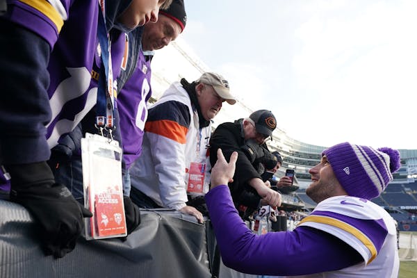 Kirk Cousins greeted fans at the end of last season’s game between the Vikings and Bears in Chicago.