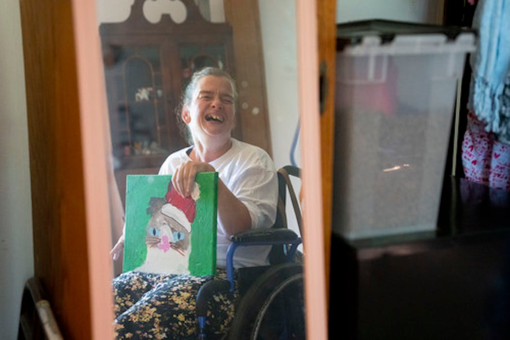 Marrie Bottelson, an artist with cerebral palsy, was so ecstatic about the settlement that she charged out of her bedroom in her wheelchair and yelled, “We won!”