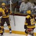 Grace Zumwinkle(12) and Taylor Wente(28) celebrate the Gophers' first goal.
