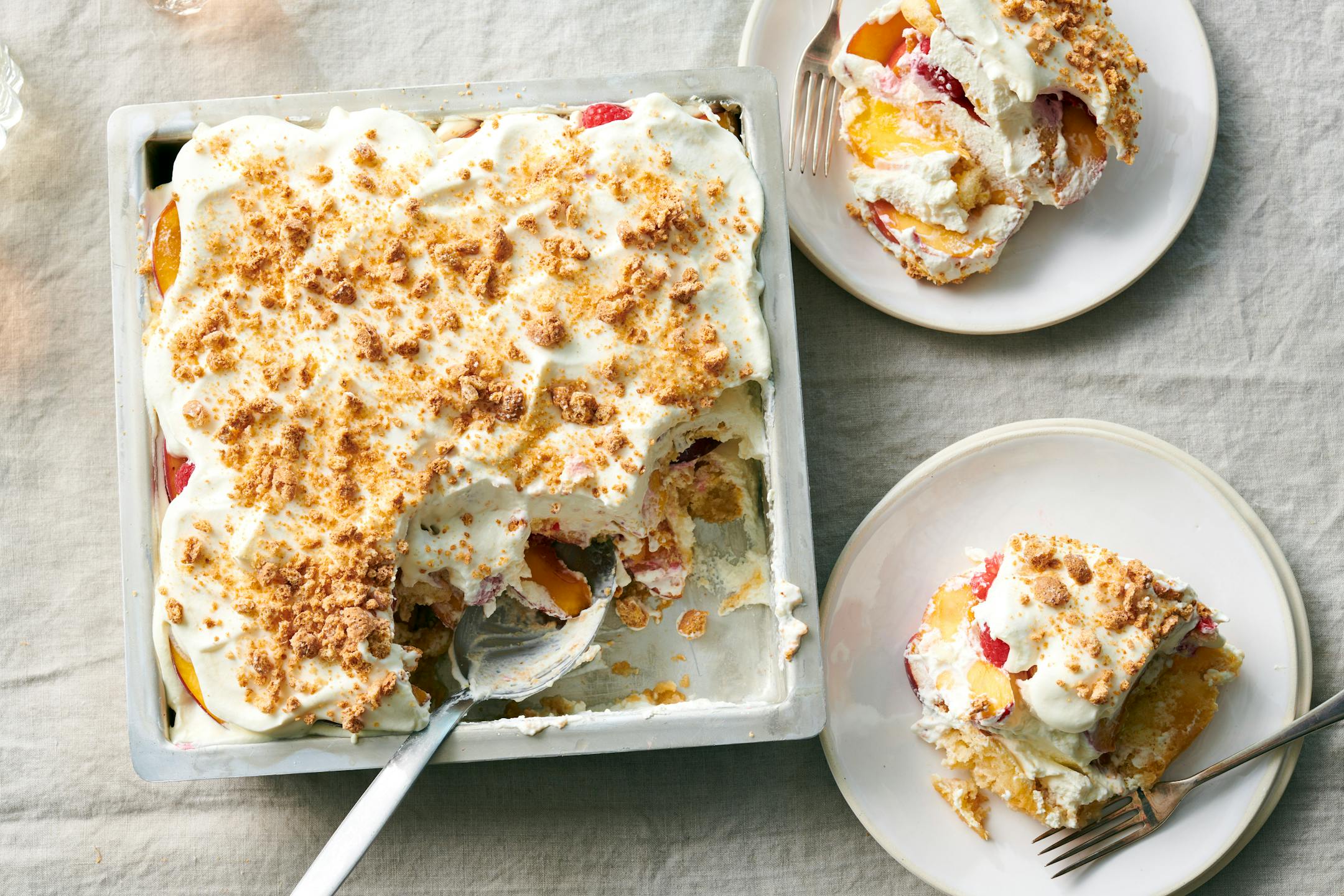 A raspberry-nectarine icebox cake. A finish of amaretti cookies takes this easy icebox cake to the next level. Food Stylist: Simon Andrews (David Malosh/The New York Times)
