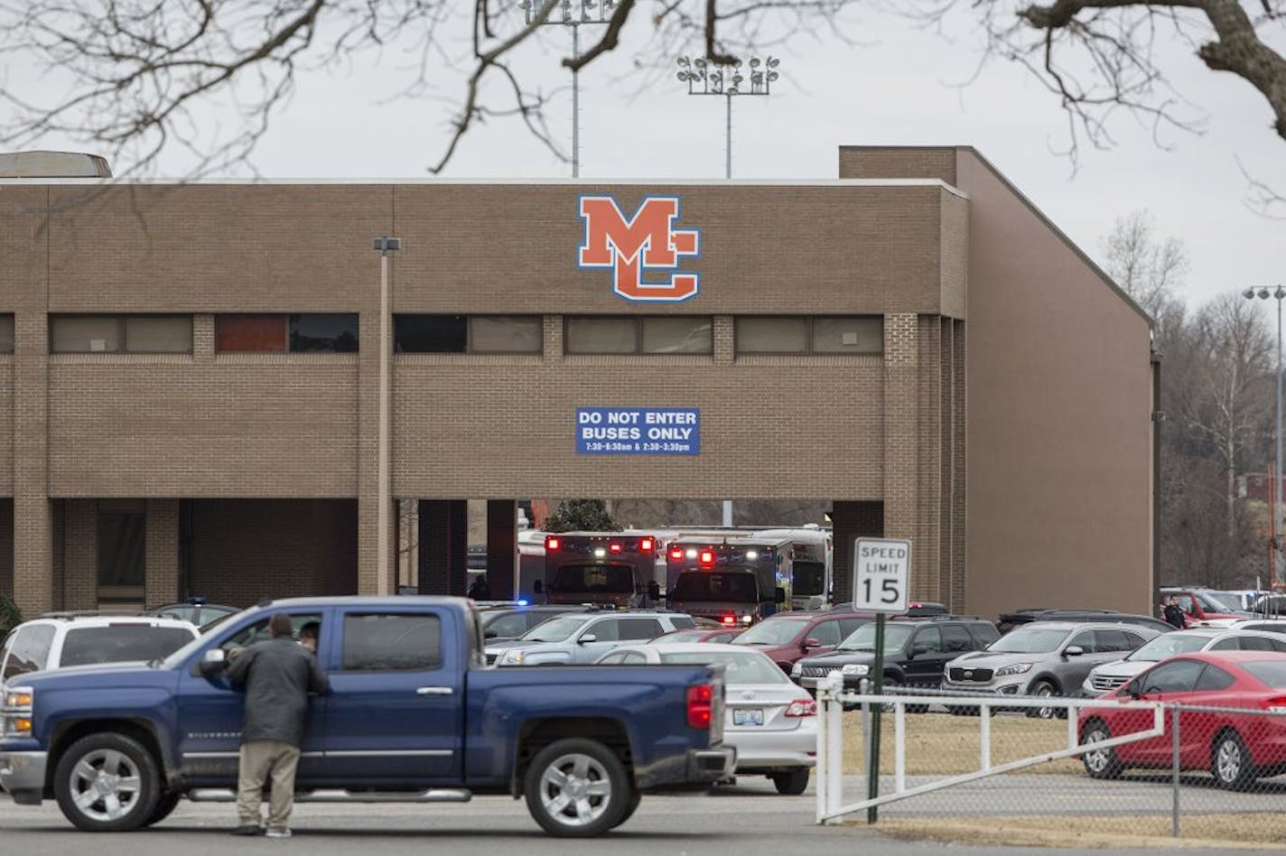 Emergency crews respond to Marshall County High School after a fatal school shooting Tuesday, Jan. 23, 2018, in Benton, Ky. Authorities said a shooting suspect was in custody.