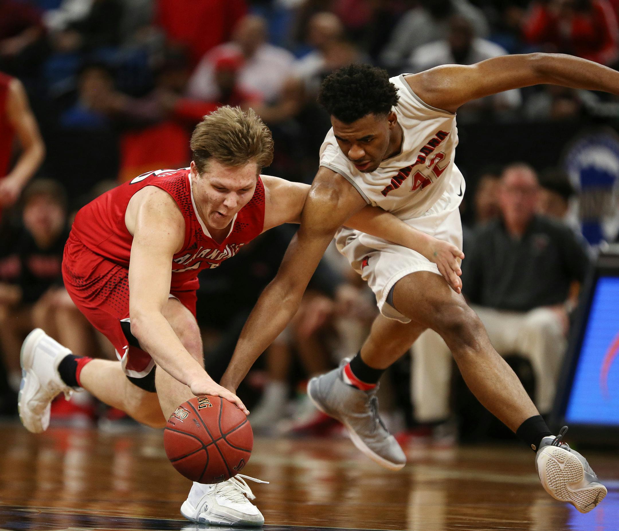 Annandale High School forward AJ Hinz (33) raced Minnehaha Academy forward JaVonni Bickham (42) for a loose ball in the first half. ] ANTHONY SOUFFLE &#xef; anthony.souffle@startribune.com Players competed during the boys' basketball state tournament Class 2A semifinal games Friday, March 24, 2017 at the Target Center in Minneapolis.