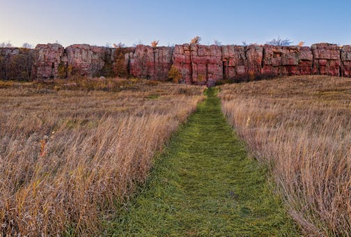 Quartzite cliffs above the prairie at Blue Mounds State Park in southwest Minnesota.