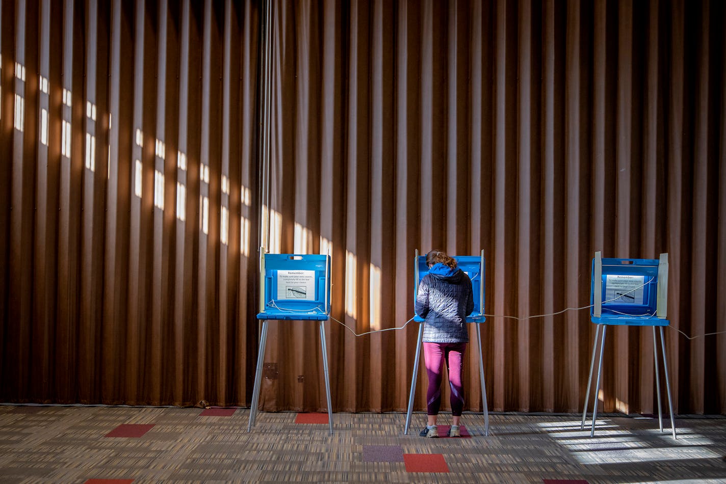 Voters cast their vote at Temple Of Aaron on Election Day Tuesday, Nov. 2, 2021, in St. Paul, Minn. (Elizabeth Flores/Star Tribune via AP)